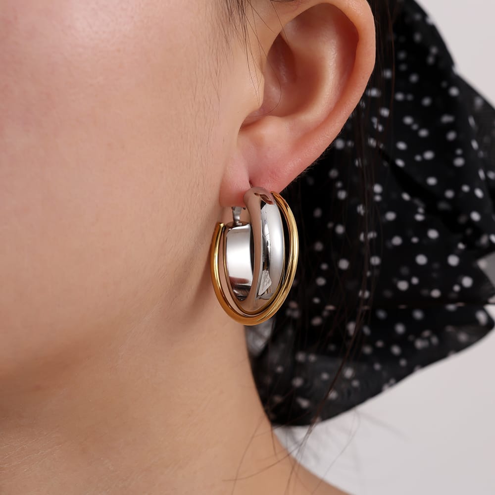 Große Bicolor-Creolen mit geschwungenem Doppelring-Design